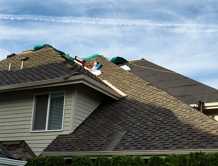 Roofing repairs on a shingle roof